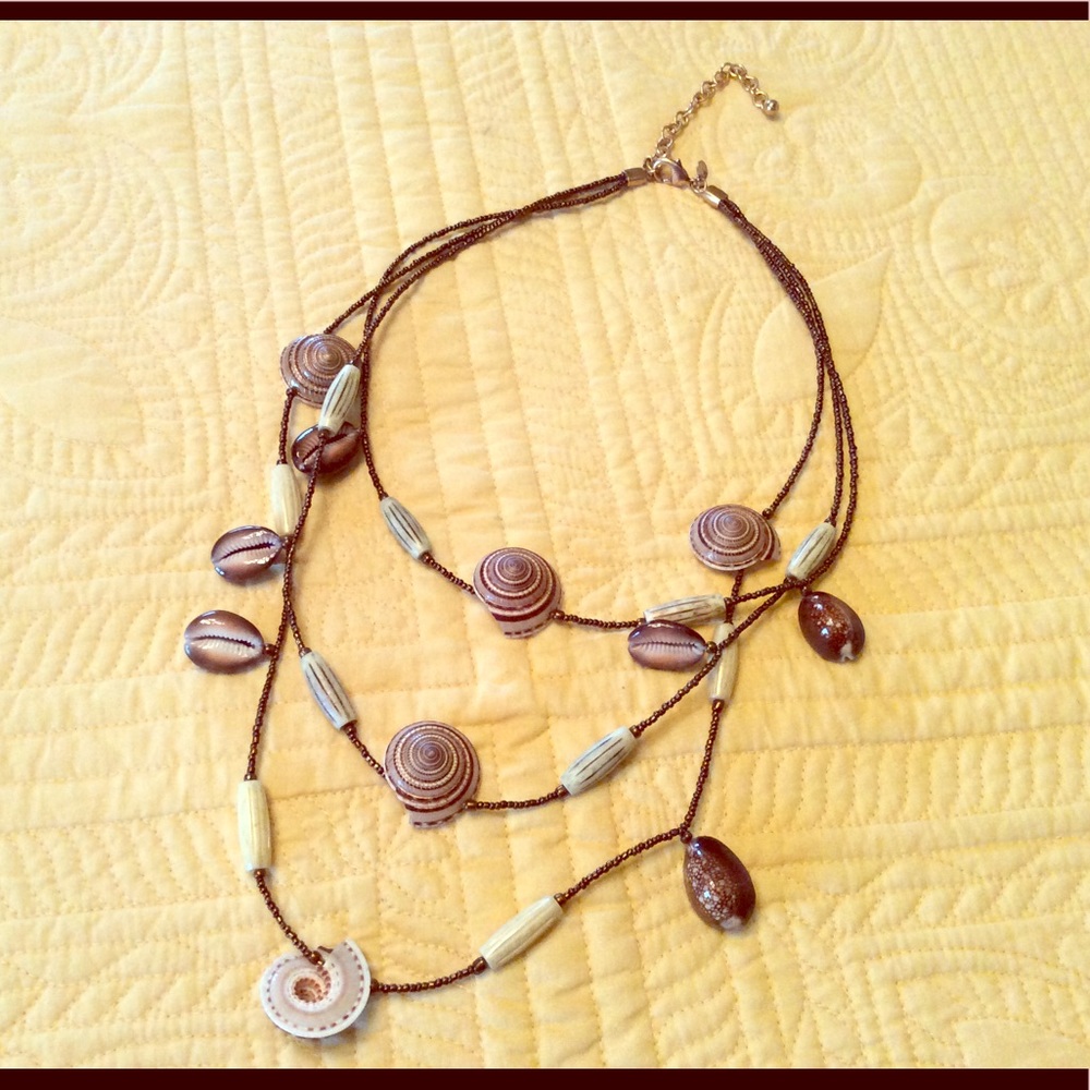2 for $12. Triple string shells and beads necklace
